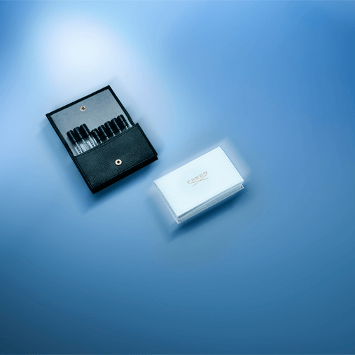 Black & White Leather Wallets housing fragrance samples